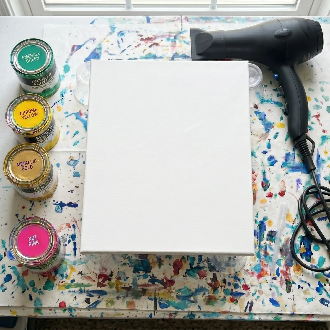 Module 1: workspace setup with acrylic paints, canvas, and hairdryer